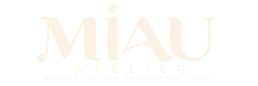 Miau Atelier wordmark, ivory on chocolate